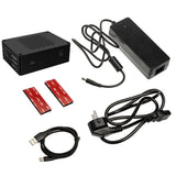 Collection of electronic components including a black box, power adapter, USB cable, and red connectors on a white background.